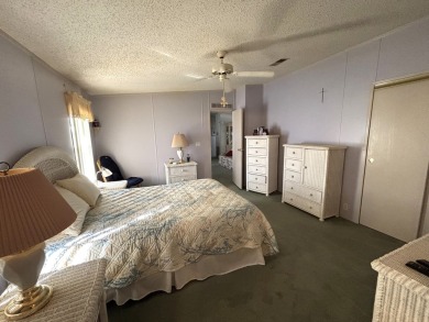 This home is located within a 55 + resort style leased land on Big Cypress Golf and Country Club in Florida - for sale on GolfHomes.com, golf home, golf lot