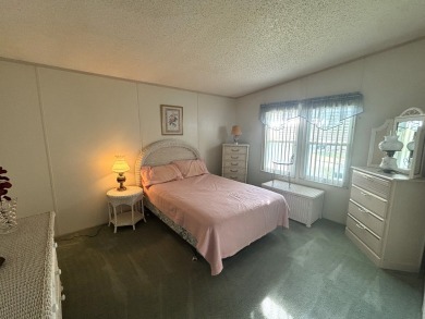 This home is located within a 55 + resort style leased land on Big Cypress Golf and Country Club in Florida - for sale on GolfHomes.com, golf home, golf lot