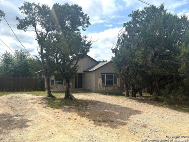 Welcome to your cozy Canyon Lake retreat, nestled under mature on Canyon Lake Golf Club in Texas - for sale on GolfHomes.com, golf home, golf lot
