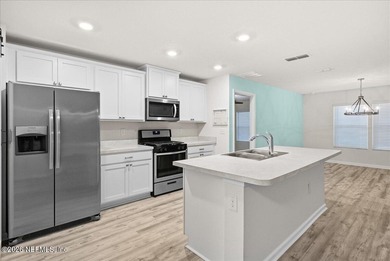 Located in the golf-cart-friendly Grand Reserve Golf Community on Grand Reserve Golf Course in Florida - for sale on GolfHomes.com, golf home, golf lot