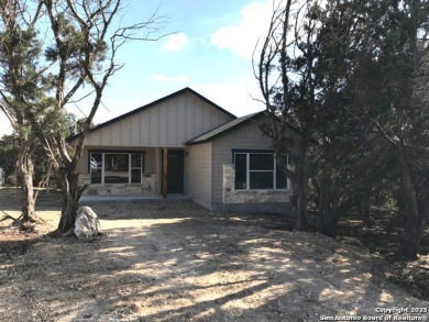Welcome to your cozy Canyon Lake retreat, nestled under mature on Canyon Lake Golf Club in Texas - for sale on GolfHomes.com, golf home, golf lot
