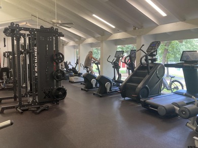 This authentic log cabin is priced to sell! Includes the on Holly Lake Ranch Golf Club in Texas - for sale on GolfHomes.com, golf home, golf lot