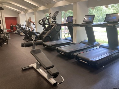 This authentic log cabin is priced to sell! Includes the on Holly Lake Ranch Golf Club in Texas - for sale on GolfHomes.com, golf home, golf lot