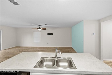 Located in the golf-cart-friendly Grand Reserve Golf Community on Grand Reserve Golf Course in Florida - for sale on GolfHomes.com, golf home, golf lot