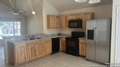 Welcome to your cozy Canyon Lake retreat, nestled under mature on Canyon Lake Golf Club in Texas - for sale on GolfHomes.com, golf home, golf lot