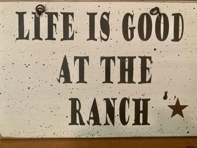 This authentic log cabin is priced to sell! Includes the on Holly Lake Ranch Golf Club in Texas - for sale on GolfHomes.com, golf home, golf lot