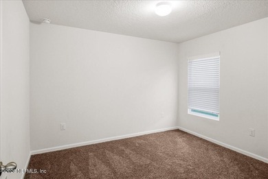 Located in the golf-cart-friendly Grand Reserve Golf Community on Grand Reserve Golf Course in Florida - for sale on GolfHomes.com, golf home, golf lot