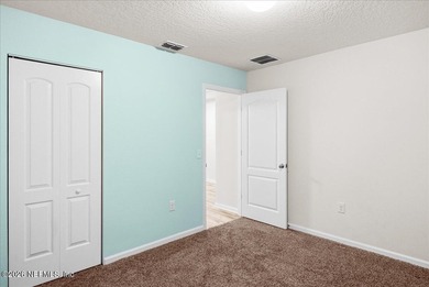 Located in the golf-cart-friendly Grand Reserve Golf Community on Grand Reserve Golf Course in Florida - for sale on GolfHomes.com, golf home, golf lot