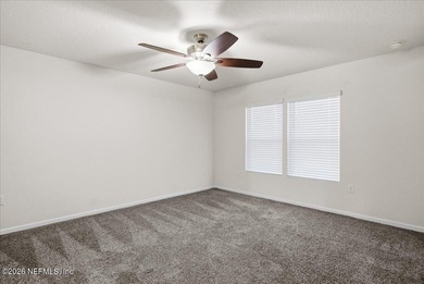 Located in the golf-cart-friendly Grand Reserve Golf Community on Grand Reserve Golf Course in Florida - for sale on GolfHomes.com, golf home, golf lot