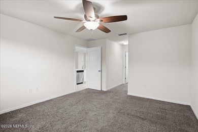 Located in the golf-cart-friendly Grand Reserve Golf Community on Grand Reserve Golf Course in Florida - for sale on GolfHomes.com, golf home, golf lot