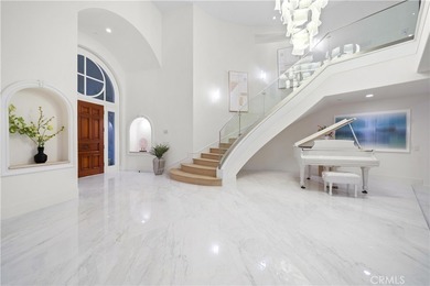 Nestled within Newport Coast's most esteemed Pelican Hill gated on Pelican Hill Golf Club in California - for sale on GolfHomes.com, golf home, golf lot