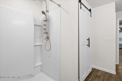 Located in the golf-cart-friendly Grand Reserve Golf Community on Grand Reserve Golf Course in Florida - for sale on GolfHomes.com, golf home, golf lot