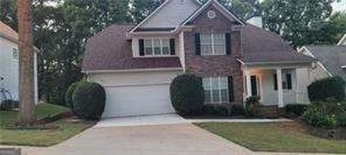 Discover this beautifully maintained 5-bedroom, 3.5 bath home on Summergrove Golf Club in Georgia - for sale on GolfHomes.com, golf home, golf lot