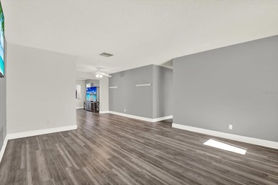 Enjoy maintenance-free, easy Florida living in this 2-bedroom on Mainlands Golf Club in Florida - for sale on GolfHomes.com, golf home, golf lot