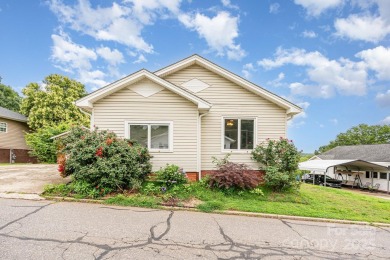 380 Woodlawn Avenue in Cramerton, NC, is a charming 2-bedroom on Cramer Mountain Country Club in North Carolina - for sale on GolfHomes.com, golf home, golf lot