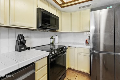 Whatta beauty! This waterfront 2 bed, 2 bath home is located in on Dobson Ranch Municipal Golf Course in Arizona - for sale on GolfHomes.com, golf home, golf lot