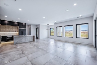 Located at 2446 E La Mancha in the prestigious gated community on Los Lagos Golf Club in Arizona - for sale on GolfHomes.com, golf home, golf lot