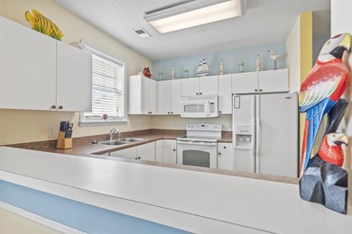 TOP FLOOR END UNIT 2 BEDROOM 2 BATH - WITH MANY UPGRADES- on Barefoot Resort and Golf Club  in South Carolina - for sale on GolfHomes.com, golf home, golf lot