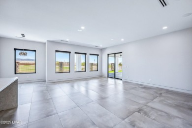 Located at 2446 E La Mancha in the prestigious gated community on Los Lagos Golf Club in Arizona - for sale on GolfHomes.com, golf home, golf lot