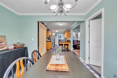 Welcome to this spacious 4-bedroom, 2-bath home in the highly on The International City Golf Course in Georgia - for sale on GolfHomes.com, golf home, golf lot
