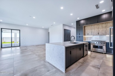 Located at 2446 E La Mancha in the prestigious gated community on Los Lagos Golf Club in Arizona - for sale on GolfHomes.com, golf home, golf lot