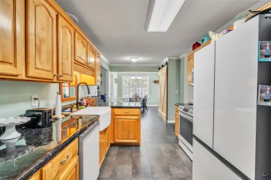 Welcome to this spacious 4-bedroom, 2-bath home in the highly on The International City Golf Course in Georgia - for sale on GolfHomes.com, golf home, golf lot