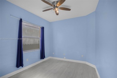 Stunning 4-bedroom, 3-bath home in the serene, gated Augusta on Keys Gate Golf Club in Florida - for sale on GolfHomes.com, golf home, golf lot