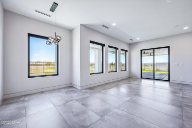 Located at 2446 E La Mancha in the prestigious gated community on Los Lagos Golf Club in Arizona - for sale on GolfHomes.com, golf home, golf lot