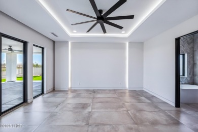 Located at 2446 E La Mancha in the prestigious gated community on Los Lagos Golf Club in Arizona - for sale on GolfHomes.com, golf home, golf lot