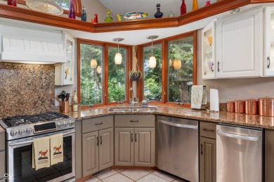 Enjoy life on the water with this 3 bedroom, 2.5 bath, lakefront on Foxcliff Golf Club in Indiana - for sale on GolfHomes.com, golf home, golf lot