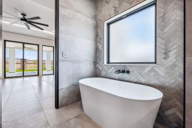 Located at 2446 E La Mancha in the prestigious gated community on Los Lagos Golf Club in Arizona - for sale on GolfHomes.com, golf home, golf lot