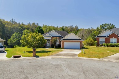 Welcome to this spacious 4-bedroom, 2-bath home in the highly on The International City Golf Course in Georgia - for sale on GolfHomes.com, golf home, golf lot