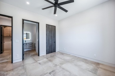 Located at 2446 E La Mancha in the prestigious gated community on Los Lagos Golf Club in Arizona - for sale on GolfHomes.com, golf home, golf lot