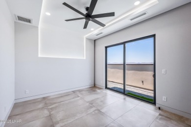Located at 2446 E La Mancha in the prestigious gated community on Los Lagos Golf Club in Arizona - for sale on GolfHomes.com, golf home, golf lot