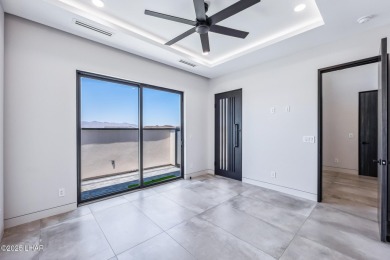 Located at 2446 E La Mancha in the prestigious gated community on Los Lagos Golf Club in Arizona - for sale on GolfHomes.com, golf home, golf lot