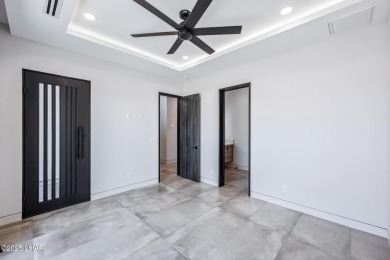 Located at 2446 E La Mancha in the prestigious gated community on Los Lagos Golf Club in Arizona - for sale on GolfHomes.com, golf home, golf lot