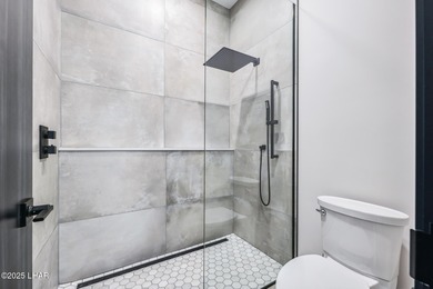 Located at 2446 E La Mancha in the prestigious gated community on Los Lagos Golf Club in Arizona - for sale on GolfHomes.com, golf home, golf lot