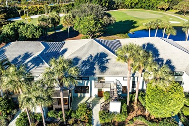 Serene golf course and pond views enhance this first-floor on Quail Ridge Golf Course and Country Club in Florida - for sale on GolfHomes.com, golf home, golf lot