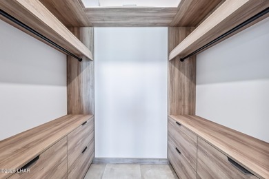 Located at 2446 E La Mancha in the prestigious gated community on Los Lagos Golf Club in Arizona - for sale on GolfHomes.com, golf home, golf lot