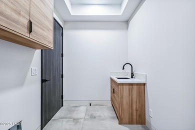 Located at 2446 E La Mancha in the prestigious gated community on Los Lagos Golf Club in Arizona - for sale on GolfHomes.com, golf home, golf lot