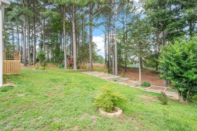 Live the life with this light and bright 4 bedroom/2.5 bath golf on Heritage Golf Club in North Carolina - for sale on GolfHomes.com, golf home, golf lot