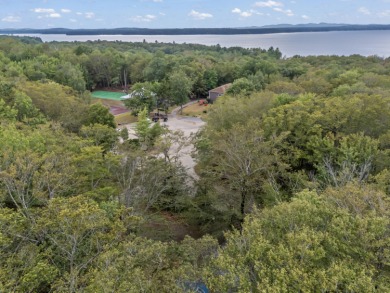 First time on the market in nearly 50 years! This classic on Frye Island Golf Club in Maine - for sale on GolfHomes.com, golf home, golf lot