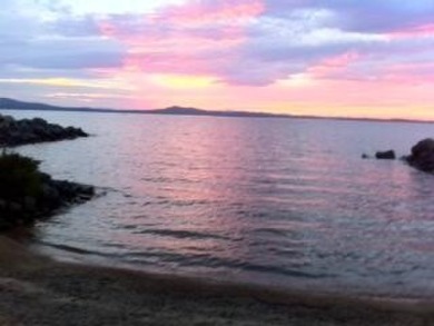 First time on the market in nearly 50 years! This classic on Frye Island Golf Club in Maine - for sale on GolfHomes.com, golf home, golf lot