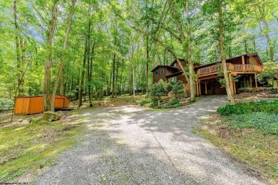 Like something out of Storybook Forest- Tucked beneath a canopy on Paradise Lake Golf Course in West Virginia - for sale on GolfHomes.com, golf home, golf lot