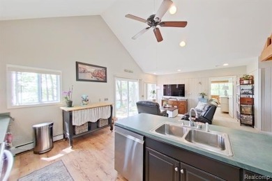 You truly can have it all!   Lakefront Luxury Meets Serene on Faulkwood Shores Golf Course in Michigan - for sale on GolfHomes.com, golf home, golf lot