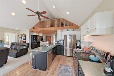 You truly can have it all!   Lakefront Luxury Meets Serene on Faulkwood Shores Golf Course in Michigan - for sale on GolfHomes.com, golf home, golf lot