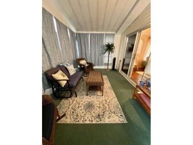 Delightful and meticulously maintained home, partially furnished on Lake Henry Golf Club in Florida - for sale on GolfHomes.com, golf home, golf lot