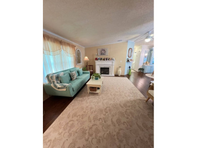 Delightful and meticulously maintained home, partially furnished on Lake Henry Golf Club in Florida - for sale on GolfHomes.com, golf home, golf lot