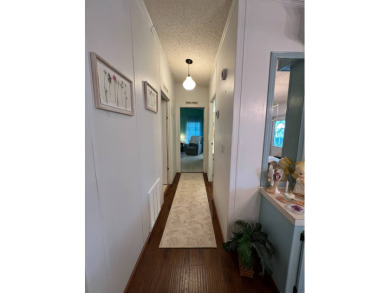 Delightful and meticulously maintained home, partially furnished on Lake Henry Golf Club in Florida - for sale on GolfHomes.com, golf home, golf lot