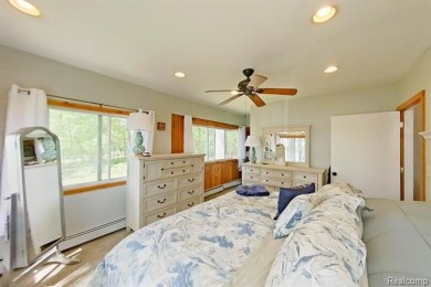 You truly can have it all!   Lakefront Luxury Meets Serene on Faulkwood Shores Golf Course in Michigan - for sale on GolfHomes.com, golf home, golf lot